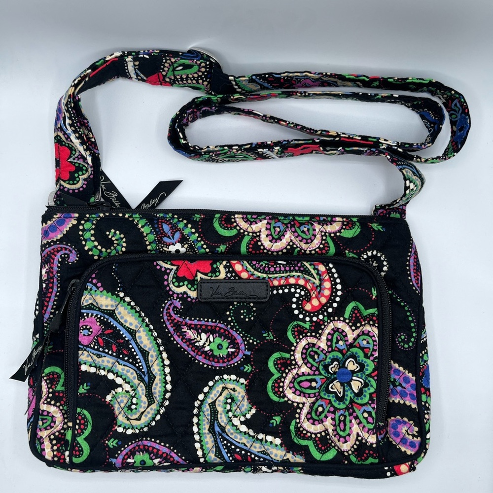 Vera Bradley cross body purse. Black and Paisley design. Adjustable strap.